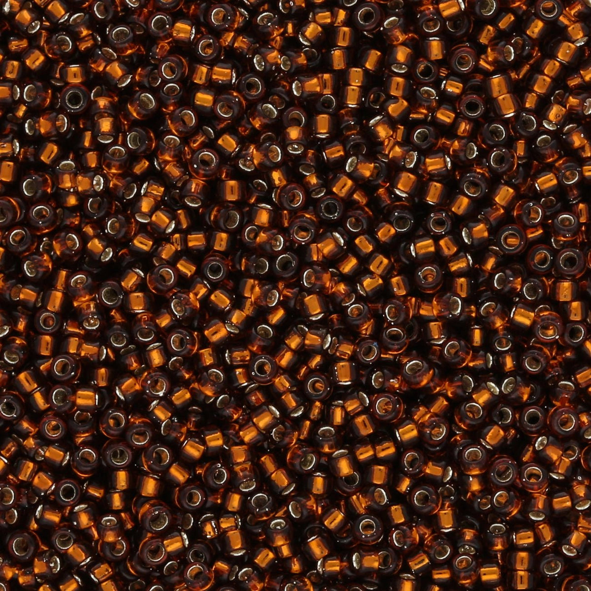 Rocailles - Perlen Toho 15/0 – Silver - Lined Smoky Topaz - PerlineBeads SA