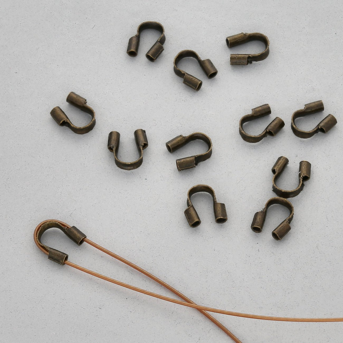 Drahtschutz (Wire guardian) aus Messing – Farbe Bronze - PerlineBeads