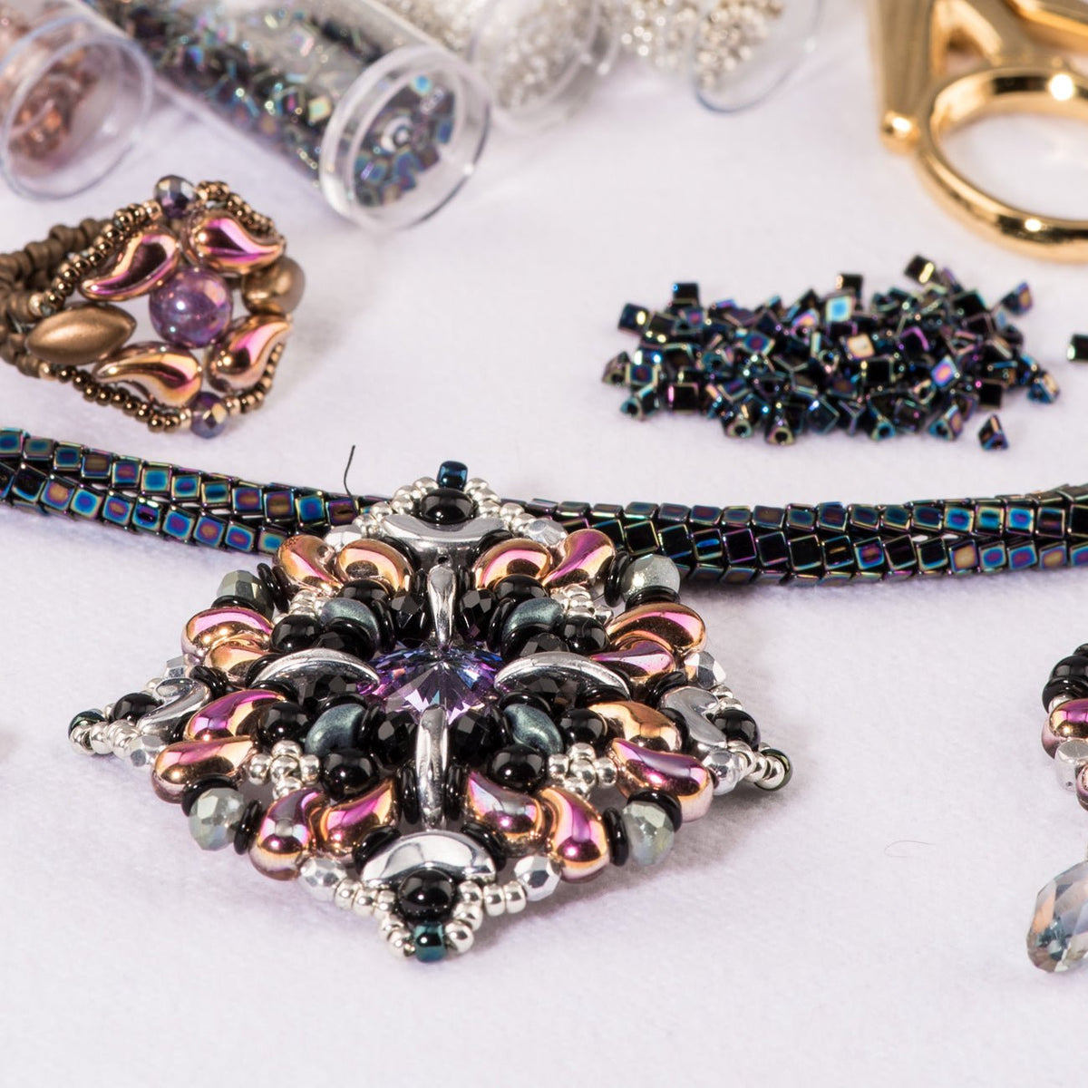 Miyuki Sharp Triangle 10/0 - Metallic Var. Blue Iris - PerlineBeads