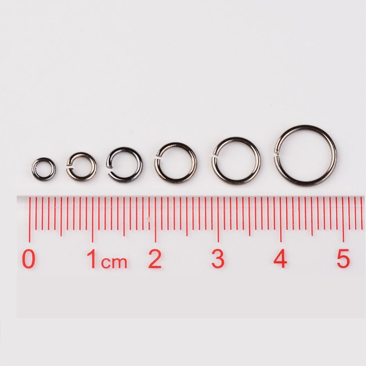 Biegeringe - Assortiert in Box – Gunmetal - PerlineBeads SA