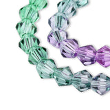 Doppelkegel aus Glas ⋅ 6 mm ⋅ Forest Bloom - PerlineBeads SA