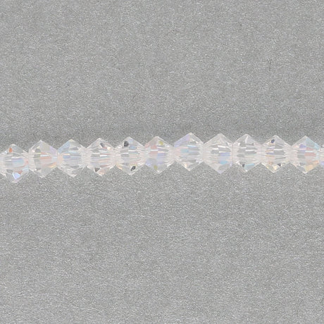 M.C. Doppelkegel 3 mm - Crystal AB - PerlineBeads SA