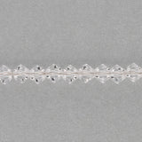 M.C. Doppelkegel 4 mm - Crystal - PerlineBeads SA