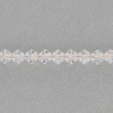 M.C. Doppelkegel 4 mm - Crystal AB - PerlineBeads SA