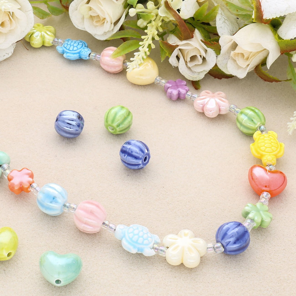 Porzellanperlen "Blumen" - bunte Mischung (5 Stk.) - PerlineBeads