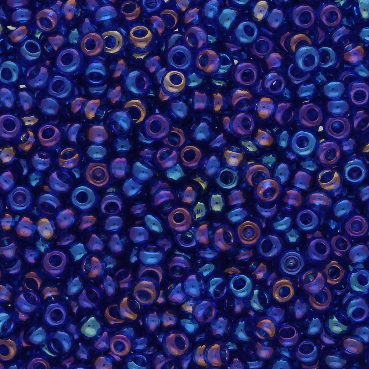 Rocailles - Perlen Toho 11/0 – Transparent - Rainbow Cobalt - PerlineBeads SA