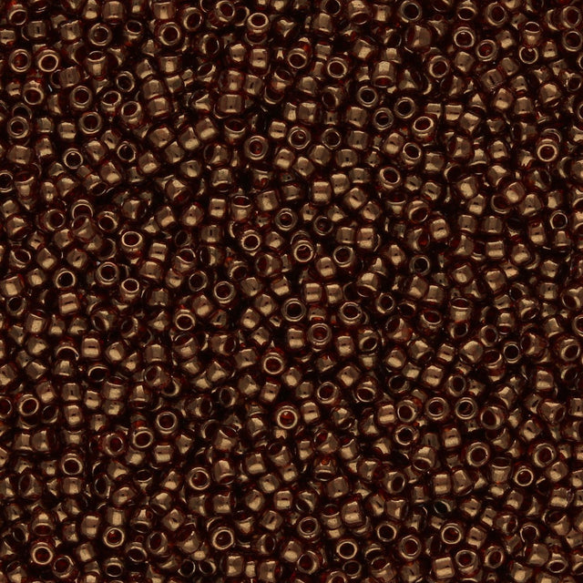 Rocailles-Perlen Toho 15/0 – Gold-Lustered African Sunset - PerlineBeads