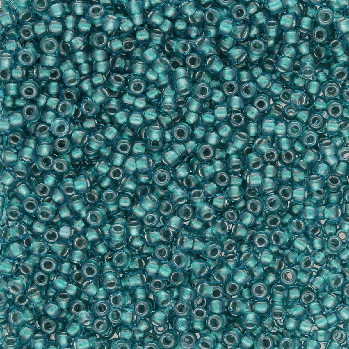 Rocailles - Perlen Toho 15/0 – Inside - Color Lt Sapphire/Metallic Teal - Lined - PerlineBeads SA