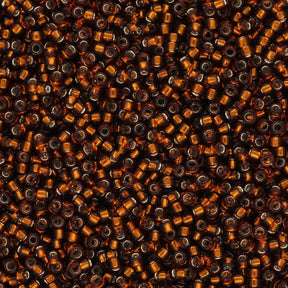 Rocailles - Perlen Toho 15/0 – Silver - Lined Smoky Topaz - PerlineBeads SA