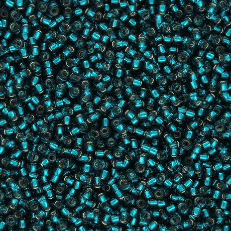 Rocailles - Perlen Toho 15/0 – Silver - Lined Teal - PerlineBeads SA