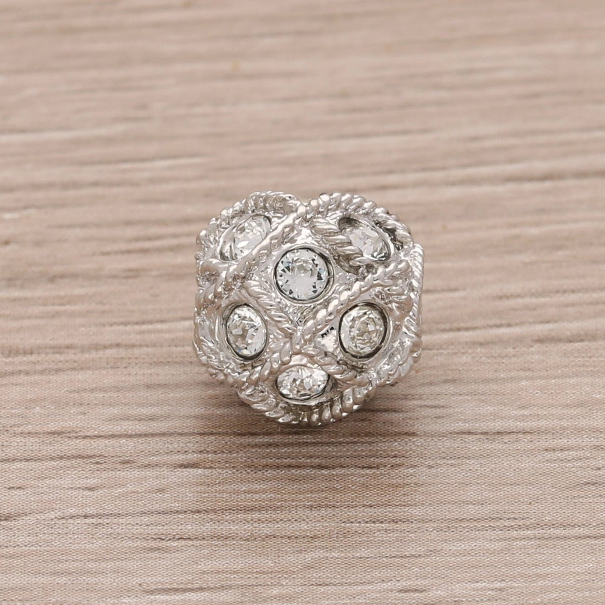 Runde Metallperle 10 mm rhodiniert mit 15 Swarovski® Kristalle - PerlineBeads SA