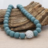Runde Metallperle 17 mm rhodiniert mit 56 Swarovski® Kristalle - PerlineBeads SA
