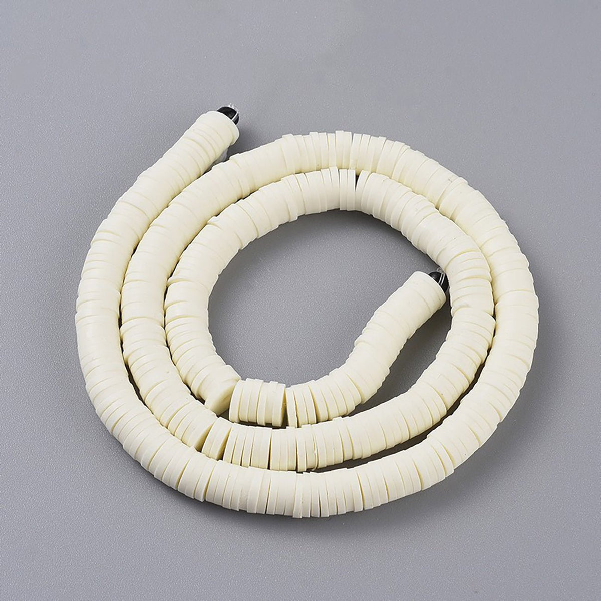 Heishi-Perlen aus Polymerpaste 6 mm – Light Yellow - PerlineBeads