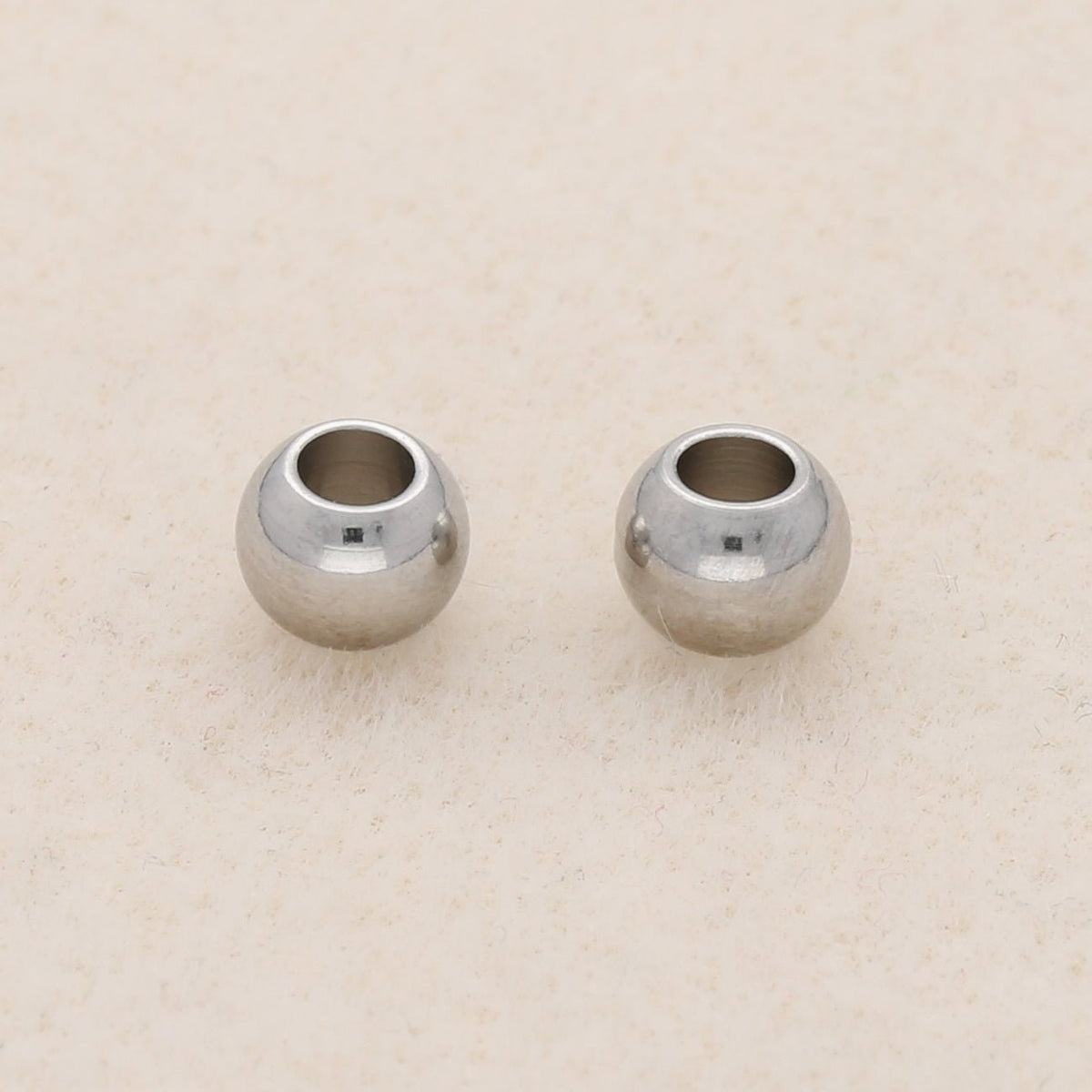 Metallperle rund - 6x5 mm - Silber - PerlineBeads