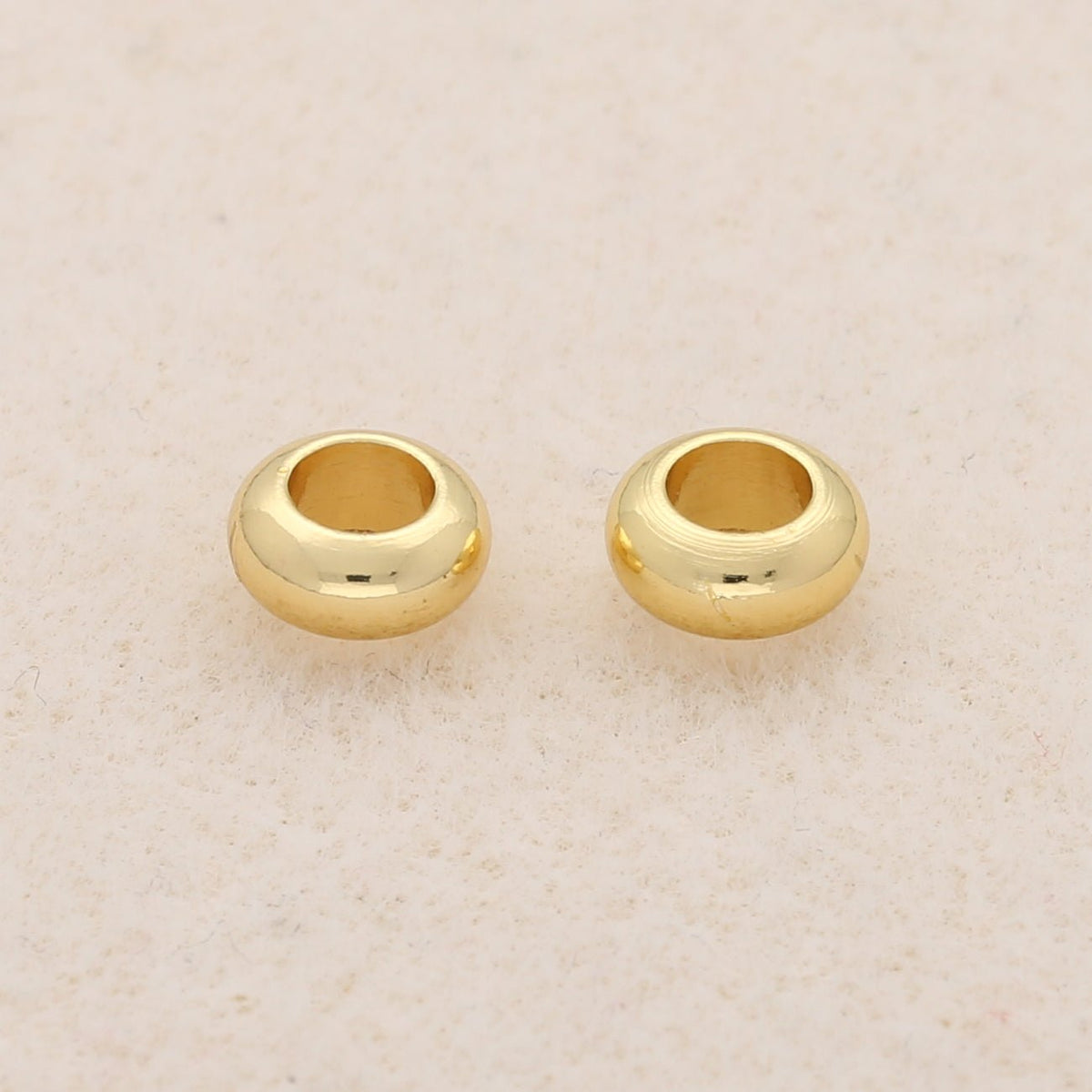 Metallperle rund - 7 x 3 mm - Gold - PerlineBeads