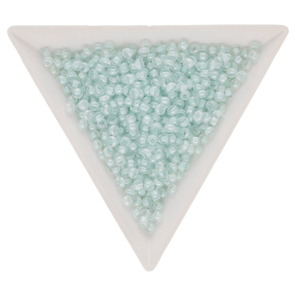 Rocailles Glasperlen 3 mm unregelmässige Grösse – Transp. inside Luster Light Cyan - PerlineBeads