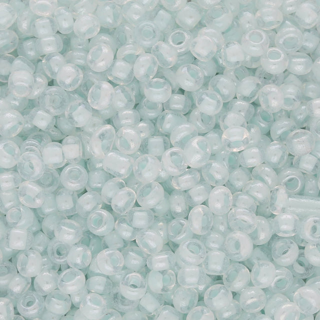 Rocailles Glasperlen 3 mm unregelmässige Grösse – Transp. inside Luster Light Cyan - PerlineBeads
