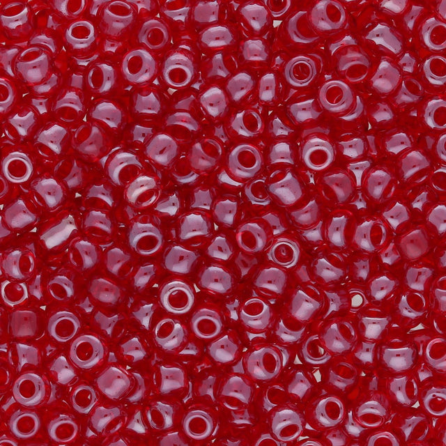 Rocailles Glasperlen 3 mm unregelmässige Grösse – Transparent Lustered Cerise - PerlineBeads