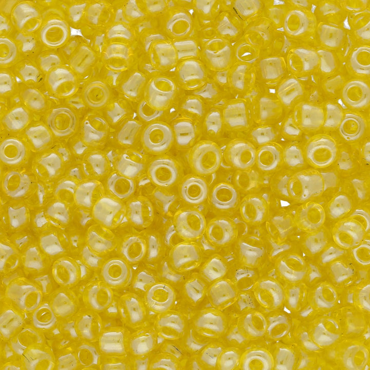 Rocailles Glasperlen 3 mm unregelmässige Grösse – Transparent Lustered Yellow - PerlineBeads