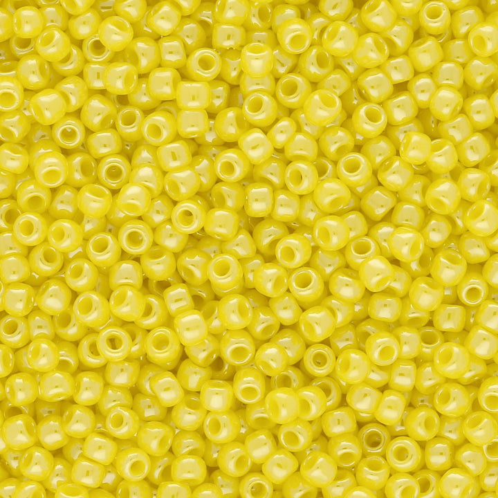 Rocailles-Perlen Toho 11/0 – Opaque Lustered Dandelion - PerlineBeads