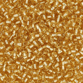 Rocailles-Perlen Toho 11/0 – Silver-Lined Light Topaz - PerlineBeads