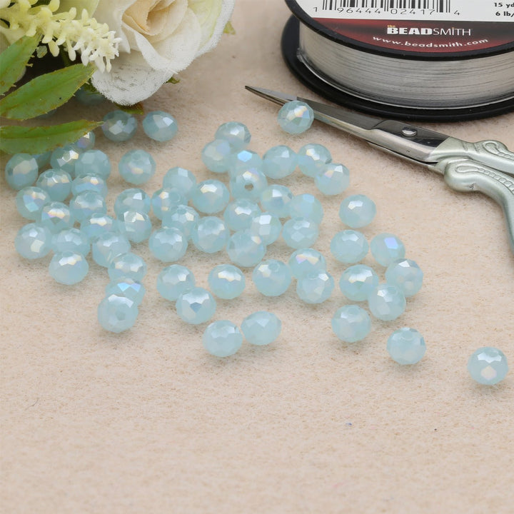 Rondellen aus facettiertem Glas 6x5 mm - Pale Turquoise - PerlineBeads